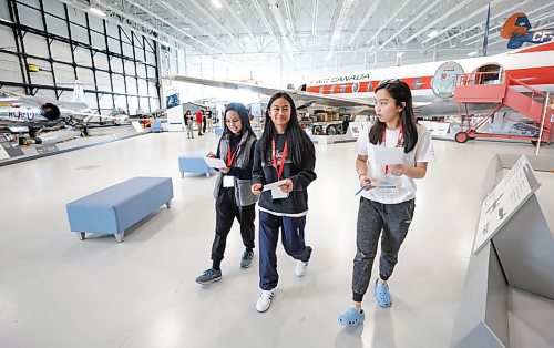 RUTH BONNEVILLE / WINNIPEG FREE PRESS 

BIZ - aviation days

Students from St. John's High School take part in a scavenger hunt with fellow students to learn more about the different aircraft during Aviation Days at the Royal Aviation Museum of Western Canada on Monday. 

Names of students:
Catelyne Melliza (grey vest)
Danielle Gatiwan  (blue)
Althea Mayol (white shirt)


Story: The Royal Aviation Museum of Western Canada is hosting &#x504;iscovery Days,&#x560;where high school students learn more about aviation and aerospace careers. The industry is anticipating a shortage of workers in the coming years.

Story by Gabby

April 6th, 2023