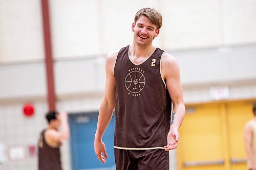 MIKAELA MACKENZIE / WINNIPEG FREE PRESS

Simon Hildebrandt (2) at U of M men&#x573; basketball practice in Winnipeg on Wednesday, Feb. 15, 2023.  For Mike Sawatzky story.

Winnipeg Free Press 2023.