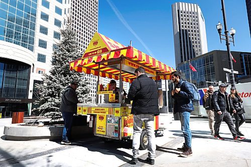 RUTH BONNEVILLE / WINNIPEG FREE PRESS 

Weather standup

Darren Yewchyn, owner of Smoke'n Bob's' Hot Dogs, opens his hot dog cart business for the first time this year in front of the Richardson Building, on the sunny corner of Portage and at Notre Dame Ave. Tuesday afternoon. 


April 11th, 2023