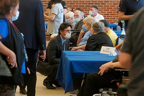 Mike Deal / Winnipeg Free Press
Prime Minister Justin Trudeau talks to residents and staff during a Passover event at The Saul and Claribel Simkin Centre, 1 Falcon Ridge Drive, Wednesday afternoon.
230412 - Wednesday, April 12, 2023.