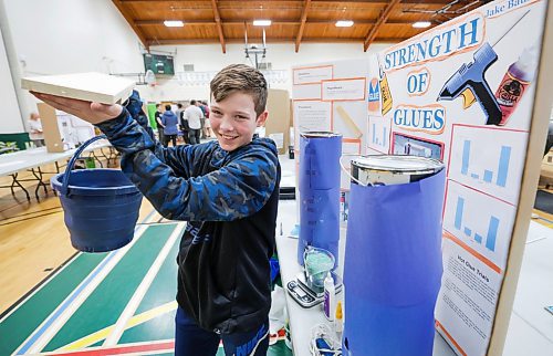 RUTH BONNEVILLE / WINNIPEG FREE PRESS 

Local stdup - Science Fair 

&#xc9;cole River Heights Grade 7 student, Jake Baumgartner, shows off his science fair project on the different strengths of glue in the Tec Voc gymnasium at the 53rd Annual Winnipeg Schools&#x2019; Science Fair on Wednesday.

More info: Winnipeg School Division holds its 53rd Annual Science Fair at Tec Voc High School on Wednesday, April 12. The event includes over 100 diverse projects from more than 260 students across the division in Grades 7 to 12.  Science Fair provides students with opportunities to explore a topic of personal interest and make meaningful connections to the curriculum while engaged in authentic scientific processes/thinking. 


April 12th, 2023