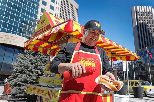 RUTH BONNEVILLE / WINNIPEG FREE PRESS 

Weather standup

Darren Yewchyn, owner of Smoke'n Bob's' Hot Dogs, opens his hot dog cart business for the first time this year in front of the Richardson Building, on the sunny corner of Portage and at Notre Dame Ave. Tuesday afternoon. 


April 11th, 2023