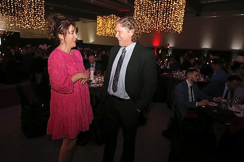 The President of the Brandon Chamber of Commerce, Tonya LaBuick shares a laugh with the Wheat City's Mayor Jeff Fawcett at the 110th annual Business Achievement Awards Gala on Thursday in the Manitoba Room of the Keystone Centre. (Michele McDougall, The Brandon Sun)  