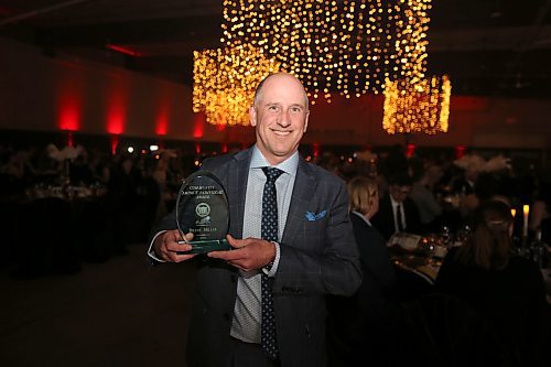 Brent Miller, general manager at the Victoria Inn, receives the Individual Community Impact award for his continued contribution to the Provincial Exhibition of Manitoba at the 10th annual Business Achievement Awards Gala, hosted by the Brandon Chamber of Commerce, on Thursday in the Manitoba Room of the Keystone Centre. Visit brandonsun.com for more. (Michele McDougall/The Brandon Sun)  