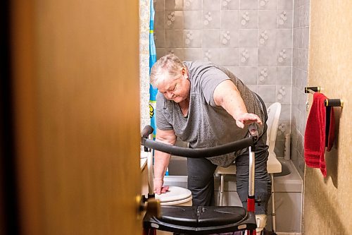 MIKAELA MACKENZIE / WINNIPEG FREE PRESS

Lois Coulson demonstrates the way that she currently has to use the shower (the bathtub makes it very difficult to get in and out with her walker and brace, even with the chair in place) in Winnipeg on Thursday, April 13, 2023. The provincial government recently announced $1.5 million in funding for retrofits like ramps and walk-in showers. For Malak story.

Winnipeg Free Press 2023.