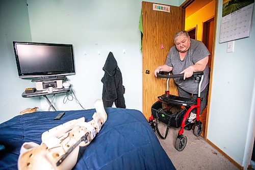 MIKAELA MACKENZIE / WINNIPEG FREE PRESS

Lois Coulson shows the carpet in her room, which makes it much more difficult to use her walker, in Winnipeg on Thursday, April 13, 2023. The provincial government recently announced $1.5 million in funding for retrofits like ramps and walk-in showers. For Malak story.

Winnipeg Free Press 2023.