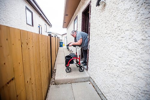 MIKAELA MACKENZIE / WINNIPEG FREE PRESS

Lois Coulson shows how she navigates the difficult step in and out of the main door with her walker in Winnipeg on Thursday, April 13, 2023. The provincial government recently announced $1.5 million in funding for retrofits like ramps and walk-in showers. For Malak story.

Winnipeg Free Press 2023.