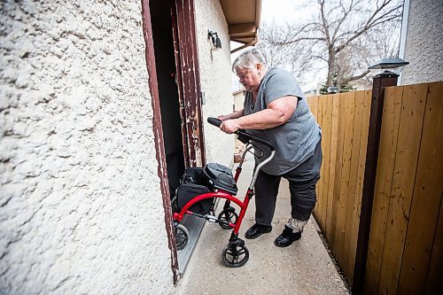 MIKAELA MACKENZIE / WINNIPEG FREE PRESS

Lois Coulson shows how she navigates the difficult step in and out of the main door with her walker in Winnipeg on Thursday, April 13, 2023. The provincial government recently announced $1.5 million in funding for retrofits like ramps and walk-in showers. For Malak story.

Winnipeg Free Press 2023.