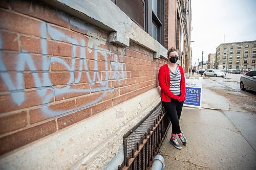 MIKAELA MACKENZIE / WINNIPEG FREE PRESS

Jordan Miller, owner of Cre8ery, poses for a photo by a tag on her building on Adelaide Street downtown in Winnipeg on Friday, April 14, 2023. For Joyanne story.

Winnipeg Free Press 2023.