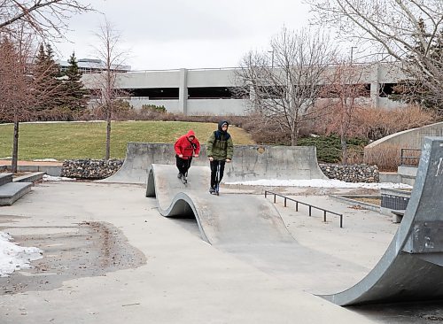 JESSICA LEE / WINNIPEG FREE PRESS

Alexander Watson (in red) and Nigel Fosseneuve are photographed at the skate park at The Forks on April 15, 2023.

Stand up