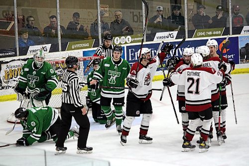 The Virden Oil Capitals celebrate Trevor Hunt's third period goal during its 7-1 win over the Portage Terriers in Game 6 of their Manitoba Junior Hockey League semifinal series at Tundra Oil & Gas Place on Sunday night. (Lucas Punkari/The Brandon Sun)