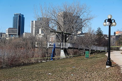 MIKE DEAL / WINNIPEG FREE PRESS
Winnipeg Police unit at a taped off along the Red River at George Street and Waterfront Drive. The taped off area includes a homeless encampment in the bushes of Fort Douglas Park and the river overlook structure. 
230417 - Monday, April 17, 2023