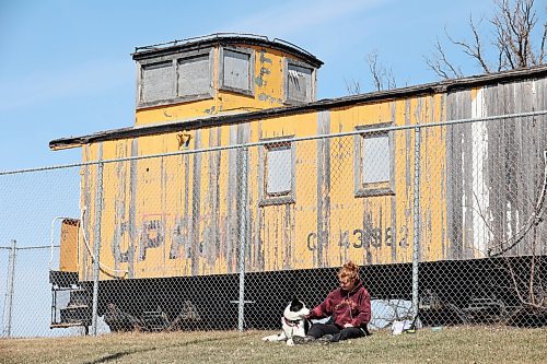 17042023
Aubrey Burgoyne visits with her dog Franklin at Dinsdale Park on a warm and sunny Monday afternoon. 
(Tim Smith/The Brandon Sun)
