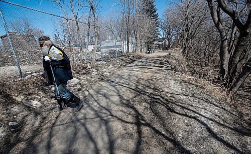 JOHN WOODS / WINNIPEG FREE PRESS
Herman Holla, who found body parts in a bag down by the Red River while out for a walk, walks near the scene Monday, April 17, 2023. 

Re: Kitching