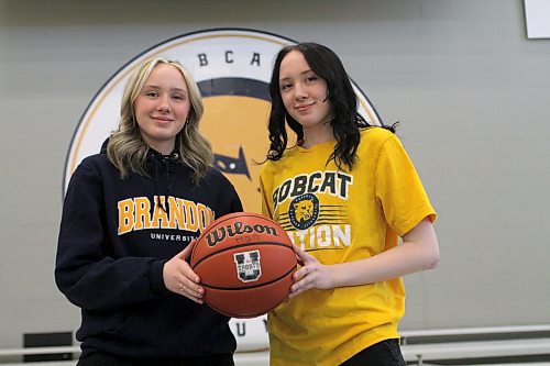 Mya, left, and Emma Cameron of Halifax committed to the Brandon University Bobcats women's basketball team for the 2023-24 Canada West season. (Thomas Friesen/The Brandon Sun)
