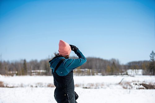 MIKAELA MACKENZIE / WINNIPEG FREE PRESS

Georgina Mustard takes a look across another section of land owned by the sand mining company near Anola on Friday, March 24, 2023. For JS story.

Winnipeg Free Press 2023.