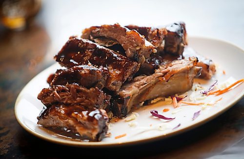 JOHN WOODS / WINNIPEG FREE PRESS
BBQ Ribs at the soft opening of the Friskee Pearl, a new seafood restaurant opening in the former Earl&#x573; Main Street location, Tuesday, April 18, 2023. 

Re: Wasney