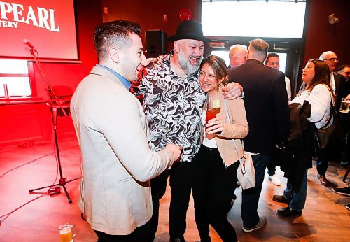 JOHN WOODS / WINNIPEG FREE PRESS
Chris Graves, owner, centre and supporters Paolo Aquila and Andrea Soriano at the soft opening of the Friskee Pearl, a new seafood restaurant opening in the former Earl&#x573; Main Street location, Tuesday, April 18, 2023. 

Re: Wasney