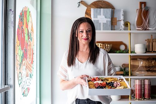 MIKAELA MACKENZIE / WINNIPEG FREE PRESS

Megan McMaster, owner of charcuterie shop Peckish, poses for a photo in her store in Winnipeg on Wednesday, April 19, 2023. For Dave Sanderson story.

Winnipeg Free Press 2023.