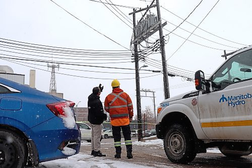 A Manitoba Hydro worker responds to the scene of a blown transformer located behind the 7th Street Health Access Clinic in Brandon. This blown transformer caused around 400 Manitoba Hydro customers to lose power in the city’s downtown core throughout Thursday morning and afternoon. (Kyle Darbyson/The Brandon Sun)
