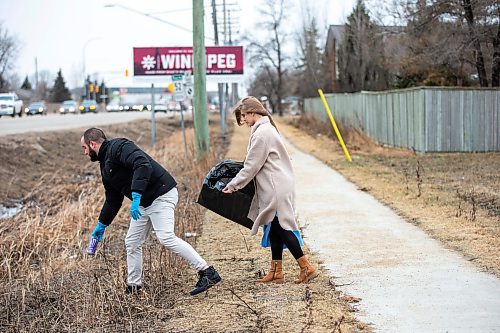 MIKAELA MACKENZIE / WINNIPEG FREE PRESS

Ivan Partsei and his wife, Vasylyna Kobuta, pose for a photo in their neighbourhood in Winnipeg on Thursday, April 20, 2023. They are organizing a community cleanup as a way of saying thank you for the support they have received from Manitobans since they arrived eight months ago. 
For Chris story.

Winnipeg Free Press 2023.