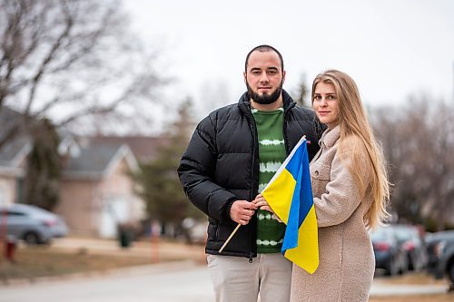 MIKAELA MACKENZIE / WINNIPEG FREE PRESS

Ivan Partsei and his wife, Vasylyna Kobuta, pose for a photo in their neighbourhood in Winnipeg on Thursday, April 20, 2023. They are organizing a community cleanup as a way of saying thank you for the support they have received from Manitobans since they arrived eight months ago. 
For Chris story.

Winnipeg Free Press 2023.