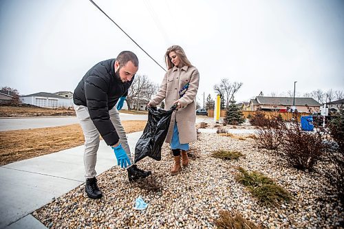 MIKAELA MACKENZIE / WINNIPEG FREE PRESS

Ivan Partsei and his wife, Vasylyna Kobuta, pose for a photo in their neighbourhood in Winnipeg on Thursday, April 20, 2023. They are organizing a community cleanup as a way of saying thank you for the support they have received from Manitobans since they arrived eight months ago. 
For Chris story.

Winnipeg Free Press 2023.