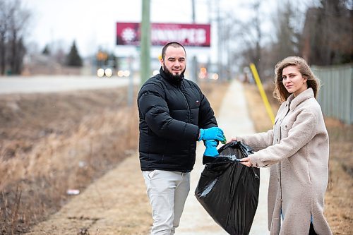 MIKAELA MACKENZIE / WINNIPEG FREE PRESS

Ivan Partsei and his wife, Vasylyna Kobuta, pose for a photo in their neighbourhood in Winnipeg on Thursday, April 20, 2023. They are organizing a community cleanup as a way of saying thank you for the support they have received from Manitobans since they arrived eight months ago. 
For Chris story.

Winnipeg Free Press 2023.