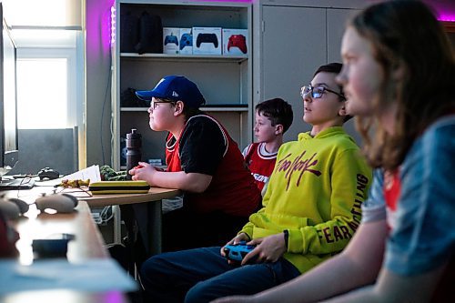 MIKAELA MACKENZIE / WINNIPEG FREE PRESS

Julian Trudel, grade seven student on the cole Dugald School (DS) Dragons esports team, warms up for a tournament with his team in Dugald on Wednesday, April 19, 2023. Schools are prioritizing esports and investing in facilities to facilitate learning through online gaming, like the DS Dragons Esports Lab. For Maggie story.

Winnipeg Free Press 2023.