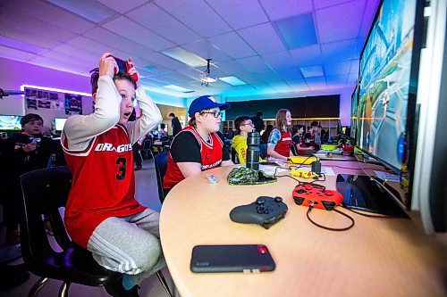 MIKAELA MACKENZIE / WINNIPEG FREE PRESS

Team Sapphire members Ayden Stone (left), Julian Trudel, Ryder Mustard, and Tia Rowan play a game in a tournament in the cole Dugald School (DS) Dragons Esports Lab in Dugald on Wednesday, April 19, 2023. Schools are prioritizing esports and investing in facilities to facilitate learning through online gaming. For Maggie story.

Winnipeg Free Press 2023.