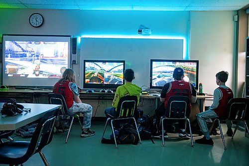 MIKAELA MACKENZIE / WINNIPEG FREE PRESS

Team Sapphire members Tia Rowan (left), Ryder Mustard, Julian Trudel, and Ayden Stone play a game in a tournament in the cole Dugald School (DS) Dragons Esports Lab in Dugald on Wednesday, April 19, 2023. Schools are prioritizing esports and investing in facilities to facilitate learning through online gaming. For Maggie story.

Winnipeg Free Press 2023.