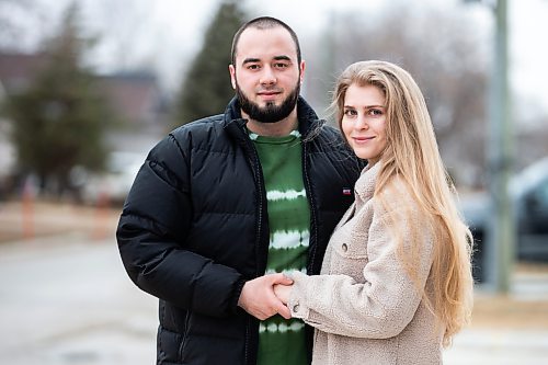 MIKAELA MACKENZIE / WINNIPEG FREE PRESS

Ivan Partsei and his wife, Vasylyna Kobuta, pose for a photo in their neighbourhood in Winnipeg on Thursday, April 20, 2023. They are organizing a community cleanup as a way of saying thank you for the support they have received from Manitobans since they arrived eight months ago. 
For Chris story.

Winnipeg Free Press 2023.