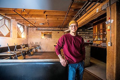 MIKAELA MACKENZIE / WINNIPEG FREE PRESS

Dylan Pereira, owner of Vertical Adventures, poses for a photo in their new location (which is a coffee shop, bar, and soon-to-be climbing space) in the Exchange District in Winnipeg on Thursday, April 20, 2023. For Gabby story.

Winnipeg Free Press 2023.