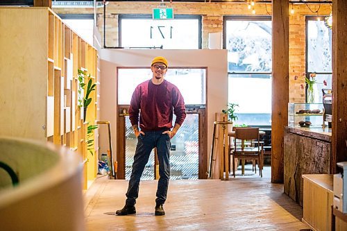 MIKAELA MACKENZIE / WINNIPEG FREE PRESS

Dylan Pereira, owner of Vertical Adventures, poses for a photo in their new location (which is a coffee shop, bar, and soon-to-be climbing space) in the Exchange District in Winnipeg on Thursday, April 20, 2023. For Gabby story.

Winnipeg Free Press 2023.