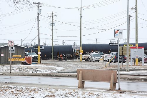 MIKE DEAL / WINNIPEG FREE PRESS
Crews from the WFPS and CP Rail attend a train derailment at the McPhillips Street underpass Friday morning. McPhillips Street will be closed for most of the day. 
230421 - Friday, April 21, 2023