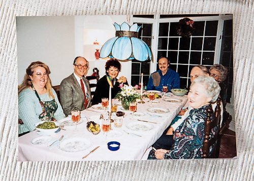 JESSICA LEE / WINNIPEG FREE PRESS

Personal photos of Diana McIntosh are photographed on April 19, 2023. Diana (third from left) and her husband Grant (second from left) are photographed during a dinner party.

Reporter: Chris Kitching