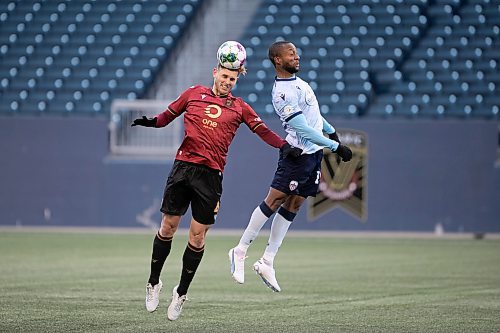 BROOK JONES / WINNIPEG FREE PRESS
Valour FC played to a 1-1 draw against Athl&#xe9;tico Ottawa at IG Field in Winnipeg, Man., Saturday, April 22, 2023. Pictured: Valour FC defender Guillaume Pianelli Balisoni heads the soccer ball during second half action. 