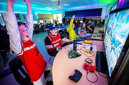 MIKAELA MACKENZIE / WINNIPEG FREE PRESS

Team Sapphire members Ayden Stone (left), Julian Trudel, Ryder Mustard, and Tia Rowan play a game in a tournament in the cole Dugald School (DS) Dragons Esports Lab in Dugald on Wednesday, April 19, 2023. Schools are prioritizing esports and investing in facilities to facilitate learning through online gaming. For Maggie story.

Winnipeg Free Press 2023.