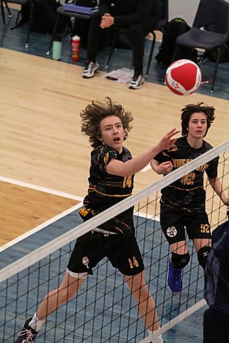 Lucas Gamache, the only non-hockey player on Wheat City Volleyball Club, tips for a point during club volleyball provincials on Sunday. (Thomas Friesen/The Brandon Sun)