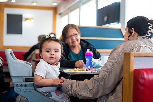 MIKAELA MACKENZIE / WINNIPEG FREE PRESS

Myla Zaitsoff (one year old) eats breakfast with her mom, Alexandrea Zaitsoff, and great-grandmother, Donna Zaitsoff, on the last day before closing at Sal&#x573; on Main Street in the North End in Winnipeg on Monday, April 24, 2023.

Winnipeg Free Press 2023.