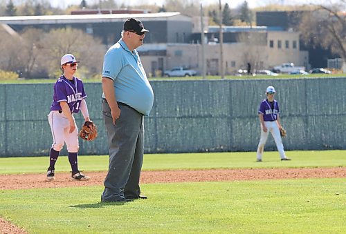Baseball umpire-in-chief Jack Reynolds keeps an eye on a high school baseball game last summer at Andrews Field. He said there should be enough umpires in Brandon this year, although they're aren't as many at the highest levels. (Perry bergson/The Brandon Sun)