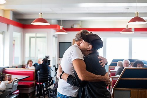 MIKAELA MACKENZIE / WINNIPEG FREE PRESS

Marty Brudy, regular for over 40 years (left), and Nancy Hansley, who has worked here for 33 years, hug on the last day before closing at Sal&#x573; on Main Street in the North End in Winnipeg on Monday, April 24, 2023.

Winnipeg Free Press 2023.