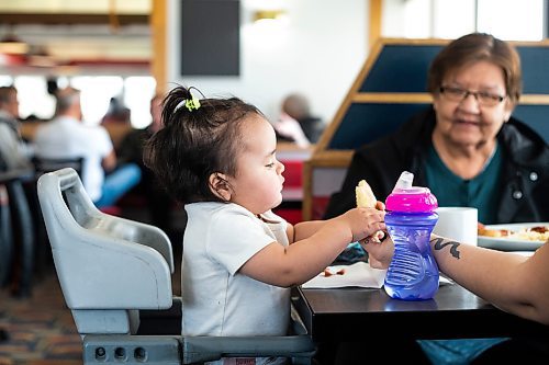 MIKAELA MACKENZIE / WINNIPEG FREE PRESS

Myla Zaitsoff (one year old) eats breakfast with her mom and great-grandmother on the last day before closing at Sal&#x573; on Main Street in the North End in Winnipeg on Monday, April 24, 2023.

Winnipeg Free Press 2023.