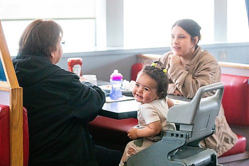 MIKAELA MACKENZIE / WINNIPEG FREE PRESS

Myla Zaitsoff (one year old) eats breakfast with her mom, Alexandrea Zaitsoff, and great-grandmother, Donna Zaitsoff, on the last day before closing at Sal&#x573; on Main Street in the North End in Winnipeg on Monday, April 24, 2023.

Winnipeg Free Press 2023.