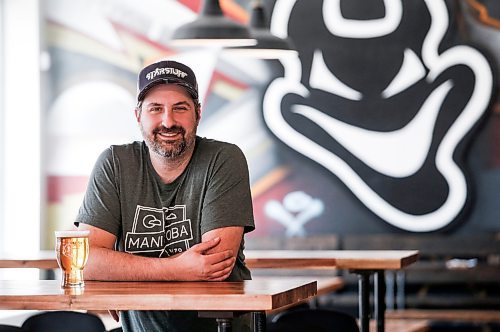 JOHN WOODS / WINNIPEG FREE PRESS
Devil May Care brewpub co-owner Colin Koop is photographed in the pub Tuesday, April 25, 2023. Koop is hoping there is another playoff game in the city. 

Re: kitching