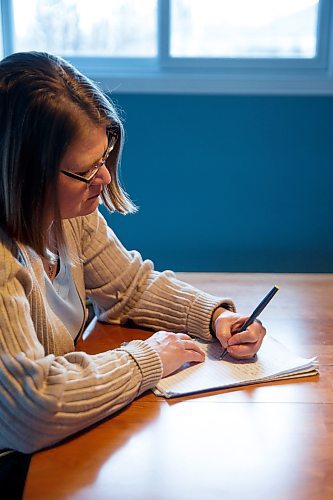 Mike Deal / Winnipeg Free Press
Poet Christine Stewart-Nun&#x303;ez does some free writing in her notebook. One of her poems was selected to be included in the Writes of Spring collection in the Winnipeg Free Press.
230425 - Tuesday, April 25, 2023.