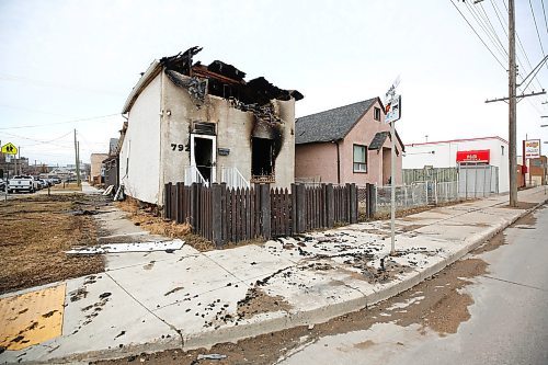 MIKE DEAL / WINNIPEG FREE PRESS
The house at 792 Logan Avenue will be demolished after the second fire there in the past six months.
WFPS crews were sent to the vacant two-storey house around 12:30 a.m. Wednesday. 
230426 - Wednesday, April 26, 2023