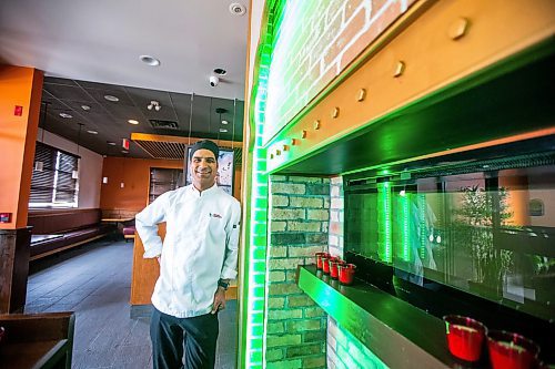 MIKAELA MACKENZIE / WINNIPEG FREE PRESS

Laxman Negi, chef and co-owner of Chilli Chutney, poses for a photo in the new location on Kenaston in Winnipeg on Wednesday, April 26, 2023. For Gabby story.

Winnipeg Free Press 2023.