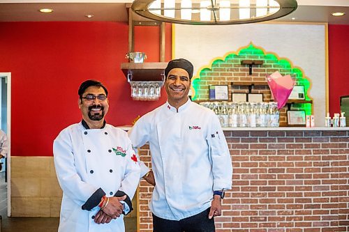 MIKAELA MACKENZIE / WINNIPEG FREE PRESS

Sarvesh Sahni (left) and Laxman Negi, chefs and co-owners of Chilli Chutney, pose for a photo in the new location on Kenaston in Winnipeg on Wednesday, April 26, 2023. For Gabby story.

Winnipeg Free Press 2023.