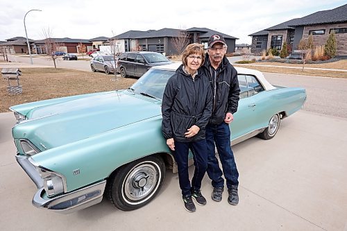 Norm and Val Poersch pose with their 1965 Pontiac Parisienne at their home in Brandon. (Photos by Tim Smith/The Brandon Sun)